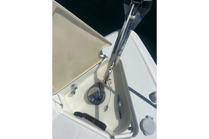  Yacht Photos Pics Anchor compartment of 2010 Cruisers Yachts 360 Express, featuring stainless steel fittings.
