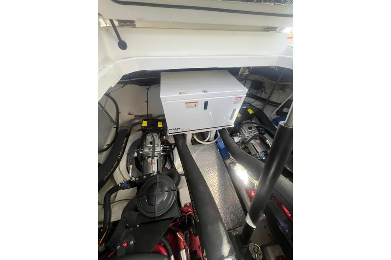  Yacht Photos Pics Engine room of 2010 Cruisers Yachts 360 Express with Kohler generator.