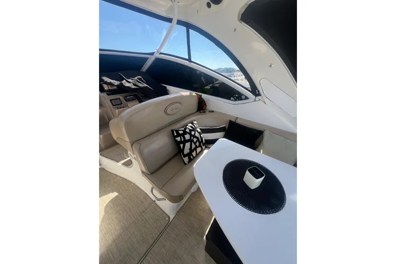  Yacht Photos Pics Luxurious interior of 2010 Cruisers Yachts 360 Express with beige seating and modern decor.