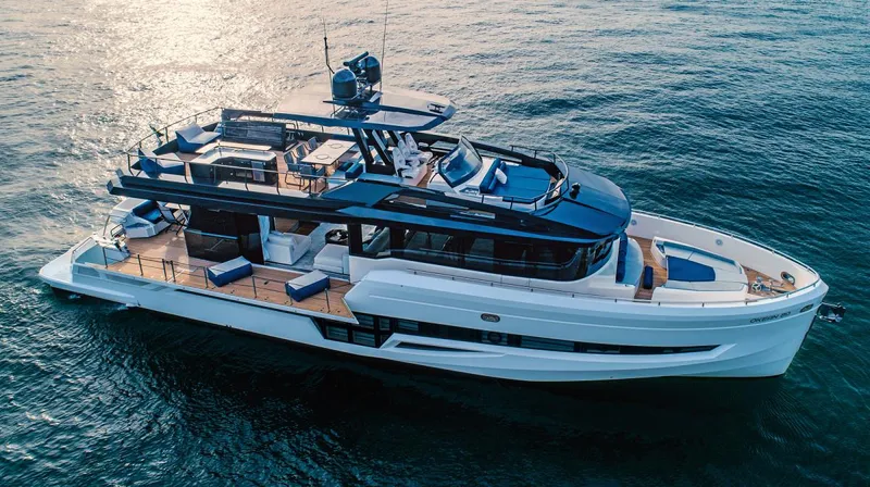  Yacht Photos Pics Luxury 2020 OKEAN 80 yacht cruising on open water, showcasing sleek design and spacious deck.