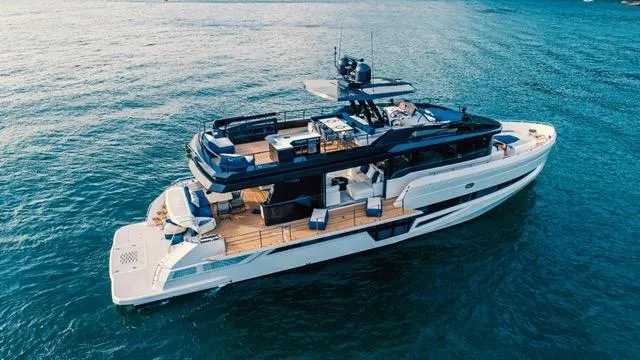  Yacht Photos Pics Luxury 2020 OKEAN 80 yacht cruising on open water, showcasing sleek design and spacious decks.
