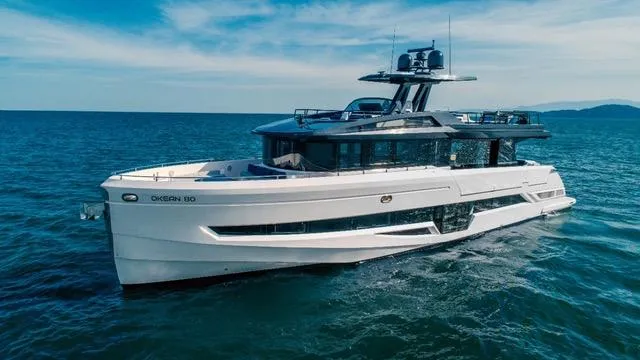  Yacht Photos Pics Luxury 2020 OKEAN 80 yacht cruising on open sea under clear skies.