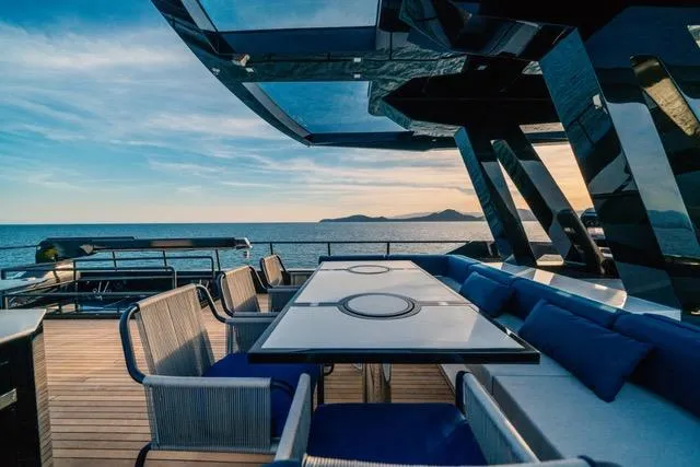  Yacht Photos Pics Luxurious 2020 OKEAN 80 yacht deck with elegant seating and ocean view.