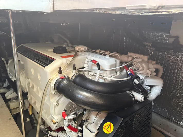  Yacht Photos Pics Engine compartment of 2004 Cruisers Yachts 455 Express Motor Yacht.