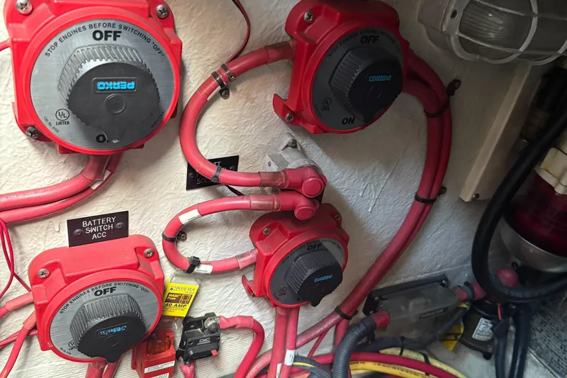  Yacht Photos Pics Electrical panel with battery switches on a 2004 Cruisers Yachts 455 Express Motor Yacht.