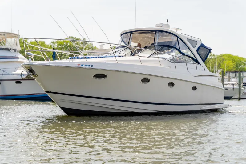  Yacht Photos Pics 2008 Regal Commodore 4060 yacht on water, featuring sleek design and modern amenities.