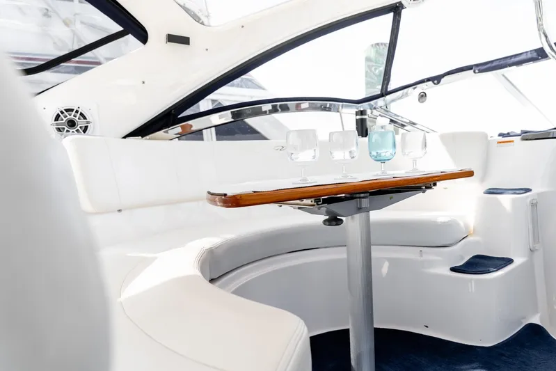  Yacht Photos Pics Luxurious interior of 2008 Regal Commodore 4060 yacht with elegant seating and glassware.