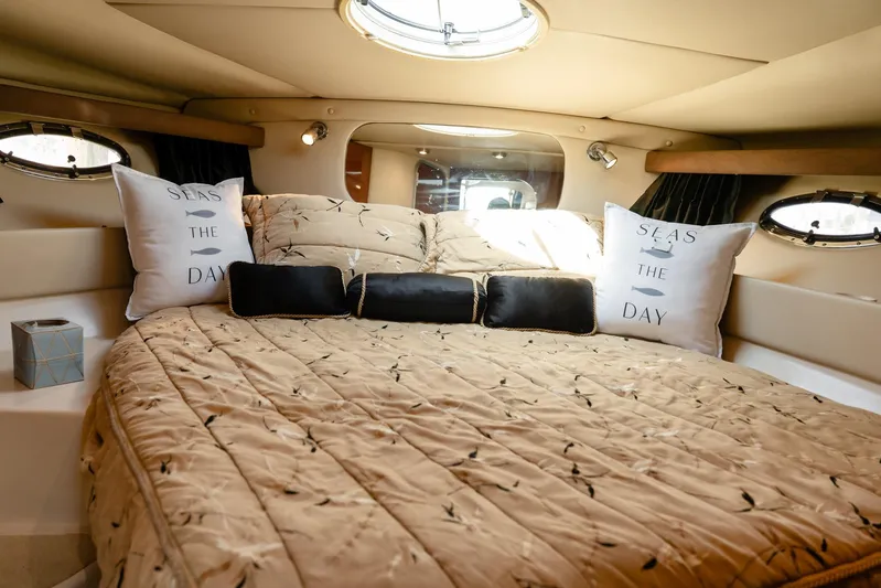  Yacht Photos Pics Luxurious cabin interior of 2008 Regal Commodore 4060 yacht with cozy bedding.