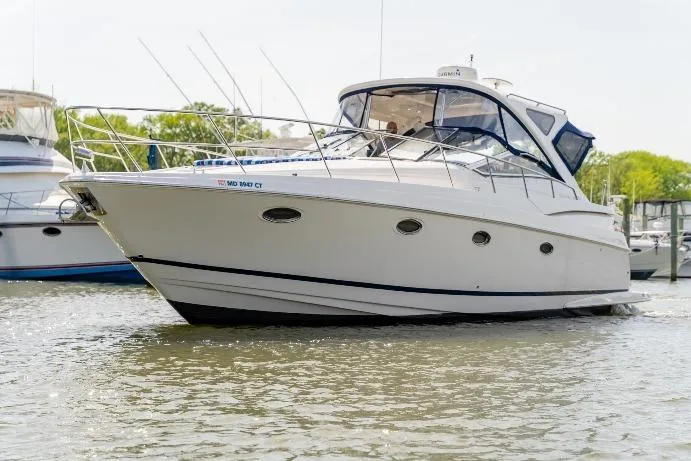  Yacht Photos Pics 2008 Regal Commodore 4060 yacht on calm water, featuring sleek design and modern amenities.