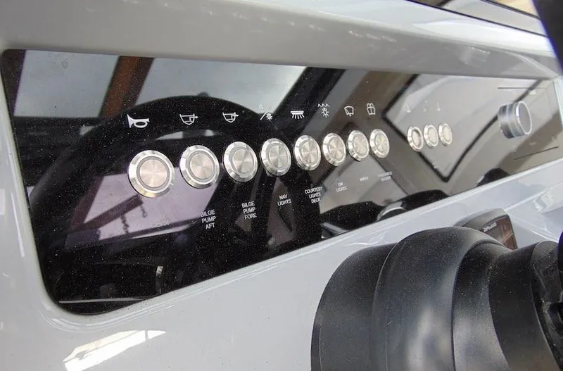  Yacht Photos Pics Control panel of 2025 Navan S30 boat with labeled buttons and switches.