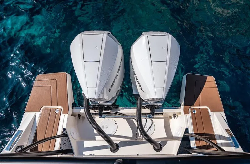  Yacht Photos Pics Twin outboard motors on a 2025 Navan S30 boat, viewed from above.