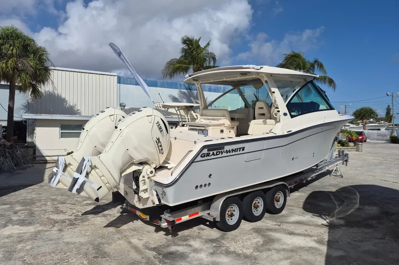 345-624 Yacht Photos Pics 2026 Grady-White Freedom 345 boat with dual Yamaha engines on a trailer.
