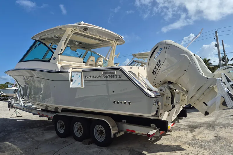 345-624 Yacht Photos Pics 2026 Grady-White Freedom 345 boat on trailer, featuring Yamaha outboard engines.