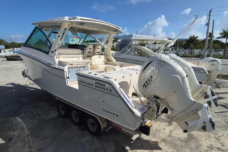 345-624 Yacht Photos Pics 2026 Grady-White Freedom 345 boat with Yamaha engines, parked outdoors.