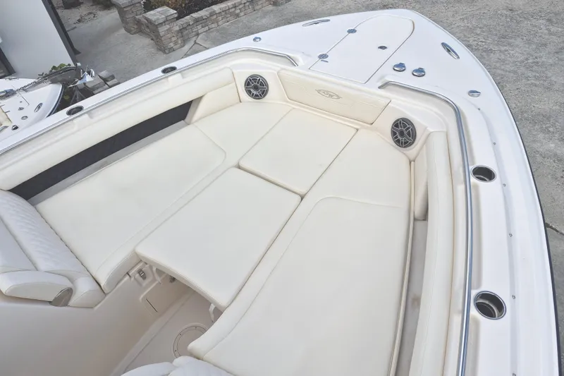 345-624 Yacht Photos Pics Luxurious seating area on 2026 Grady-White Freedom 345 boat, featuring plush white cushions.