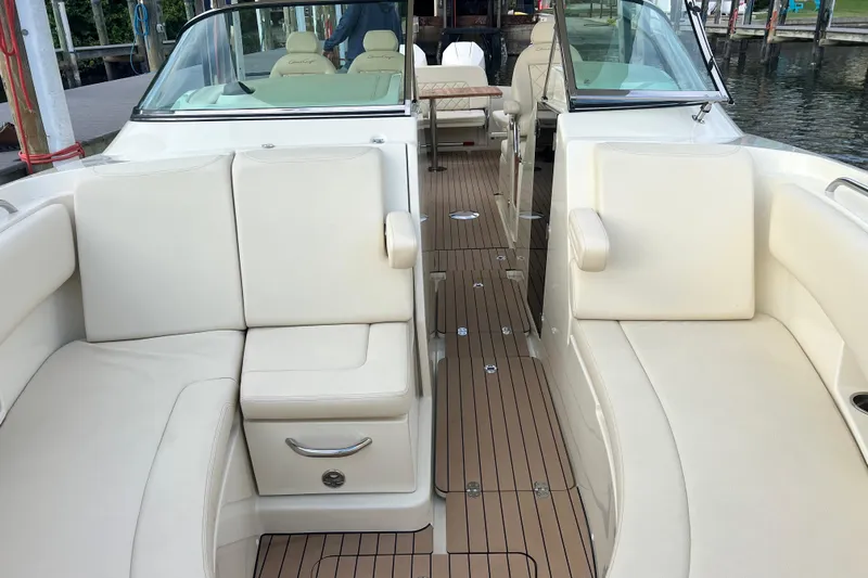  Yacht Photos Pics 2023 Chris-Craft Calypso 30 interior with luxurious seating and elegant design.