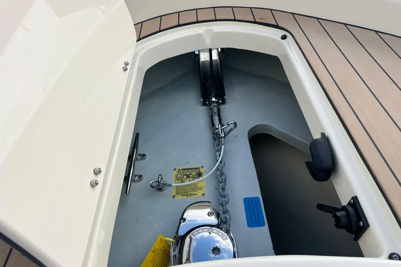  Yacht Photos Pics 2023 Chris-Craft Calypso 30 anchor compartment with chain and winch system.