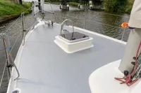 Sailboat deck view of 2012 Puffin 30 Sloop, featuring hatch and rigging.