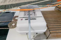 Deck of 2012 Puffin 30 Sloop with safety equipment and solar panel.