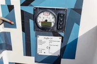 Control panel and plaque on 2012 Puffin 30 Sloop, featuring Yanmar gauge and design details.