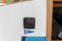 Raymarine display on 2012 Puffin 30 Sloop, featuring KNRM sticker on white panel.
