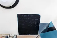 Chalkboard on Puffin 30 Sloop, 2012, with nautical notes and rope detail.