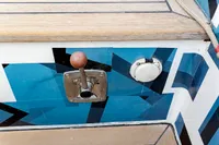 Close-up of a Puffin 30 Sloop 2012 boat's control lever and deck details.