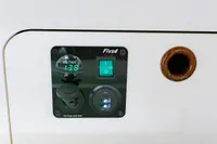 Control panel with voltage display and USB ports on 2012 Puffin 30 Sloop.