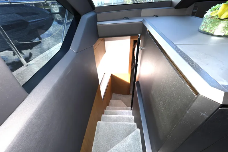  Yacht Photos Pics Staircase inside 2019 Galeon 650 Sky yacht, featuring modern design and natural lighting.