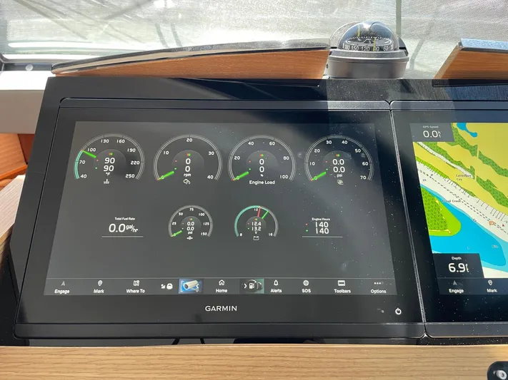 Salty Suite Yacht Photos Pics Garmin navigation display on 2023 Tiara Yachts C44 Coupe.