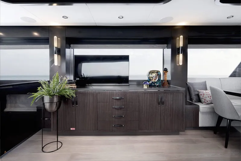 Yacht Photos Pics Luxurious interior of 2024 Sirena 68 yacht with modern cabinetry and elegant decor.