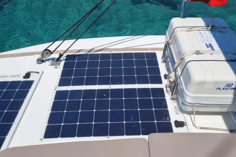  Yacht Photos Pics Solar panels on a 2019 Bali 5.4 catamaran deck, with clear blue water background.