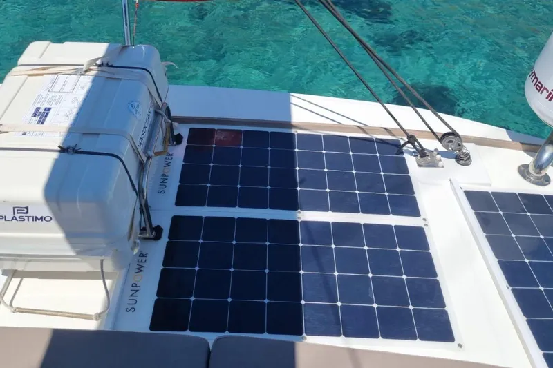  Yacht Photos Pics Solar panels on a 2019 Bali 5.4 catamaran deck, with clear blue water background.