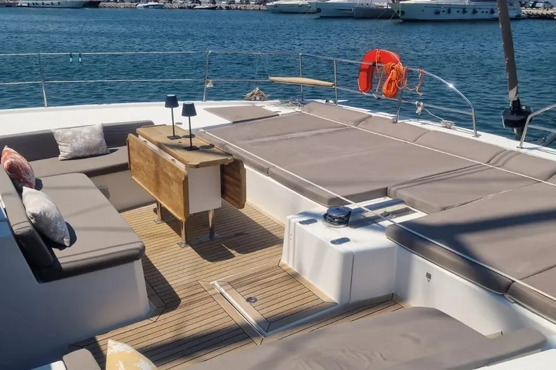  Yacht Photos Pics Luxurious 2019 Bali 5.4 yacht deck with seating and sunbathing area.