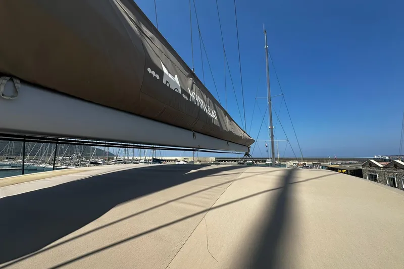  Yacht Photos Pics Sailboat deck view of 2019 Bali 5.4 model in marina under clear blue sky.