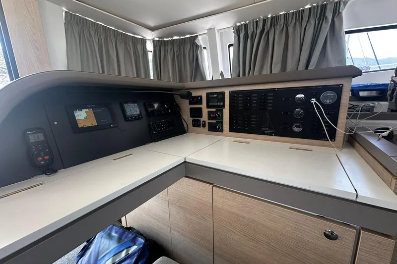  Yacht Photos Pics Interior view of 2019 Bali 5.4 yacht control panel with navigation equipment.