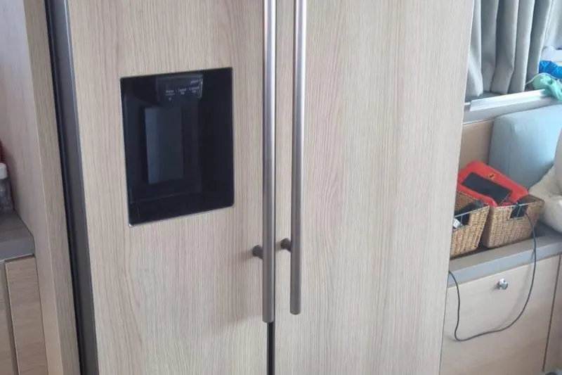  Yacht Photos Pics Modern Bali 5.4 refrigerator with wood finish and sleek handles, 2019 model.