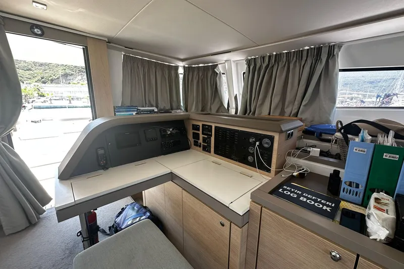  Yacht Photos Pics Interior of a 2019 Bali 5.4 yacht with navigation station and log book.