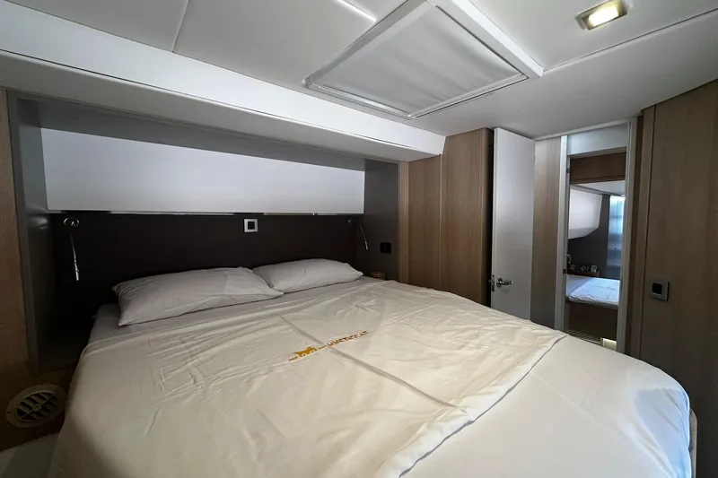  Yacht Photos Pics Luxurious bedroom interior of 2019 Bali 5.4 yacht with modern design and cozy bedding.