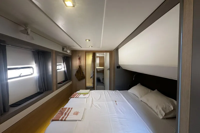  Yacht Photos Pics Luxurious interior of 2019 Bali 5.4 yacht cabin with modern design and comfortable bedding.