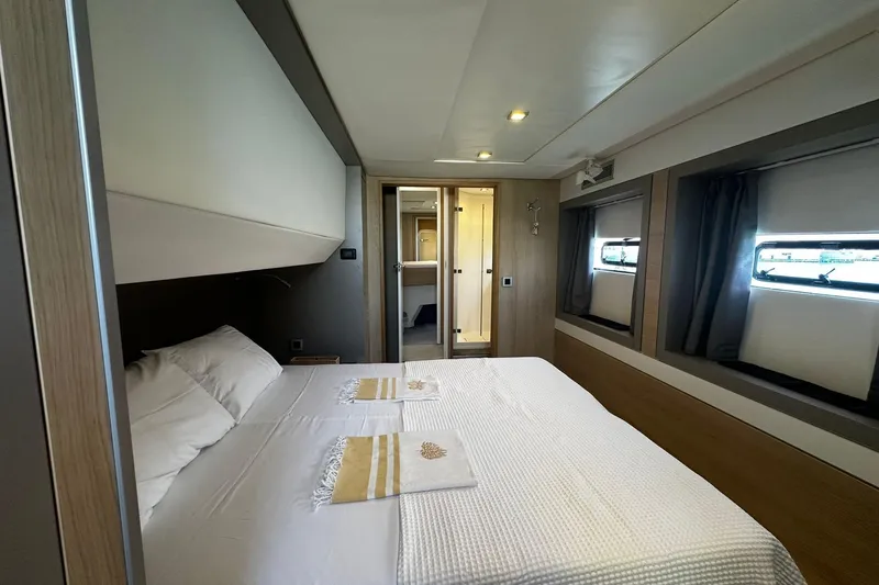  Yacht Photos Pics Luxurious bedroom interior of 2019 Bali 5.4 yacht with modern design and cozy bedding.