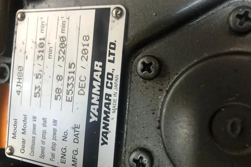  Yacht Photos Pics Close-up of a Yanmar engine plate with specifications and manufacturing details.
