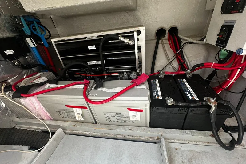  Yacht Photos Pics Battery compartment of a 2019 Bali 5.4 yacht with wiring and components.