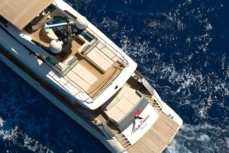 Lady Emma Yacht Photos Pics Aerial view of 2007 Guy Couach 3300 Fly yacht cruising on blue ocean waters.