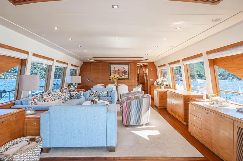 Lady Emma Yacht Photos Pics Luxurious interior of 2007 Guy Couach 3300 Fly yacht with elegant furnishings and large windows.
