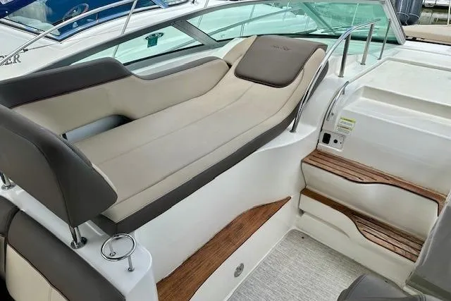  Yacht Photos Pics 2014 Sea Ray 350 Sundancer interior with cushioned seating and wooden steps.