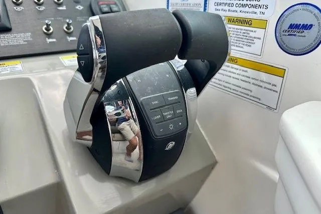  Yacht Photos Pics Throttle controls on a 2014 Sea Ray 350 Sundancer boat dashboard.