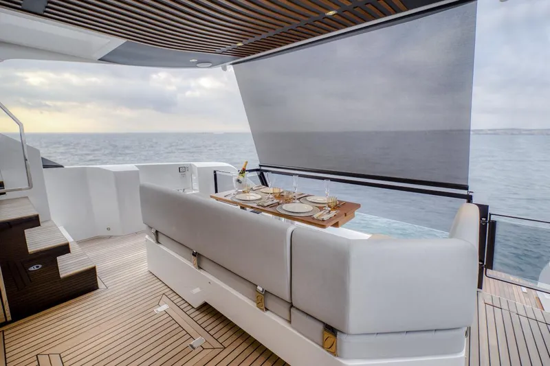 As 5 Yacht Photos Pics Luxury dining area on 2025 Astondoa AS 5 yacht with ocean view.
