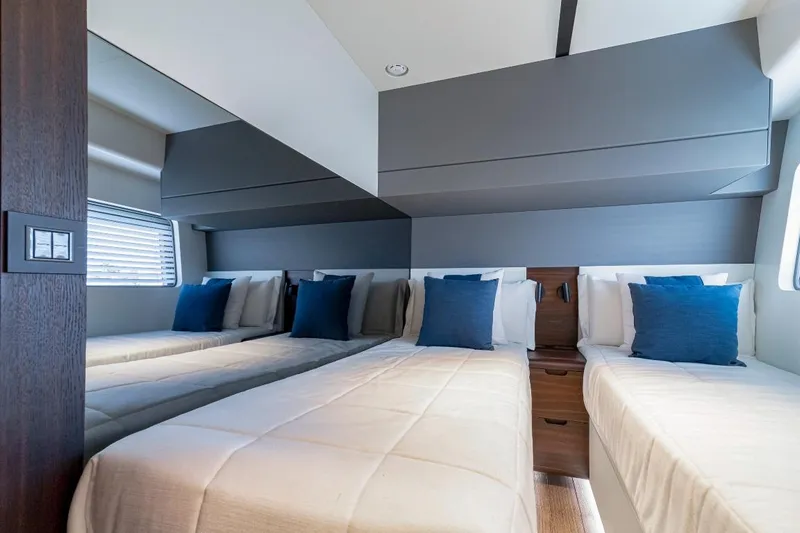 As 5 Yacht Photos Pics Luxurious twin cabin in 2025 Astondoa AS 5 yacht with modern decor and blue accents.