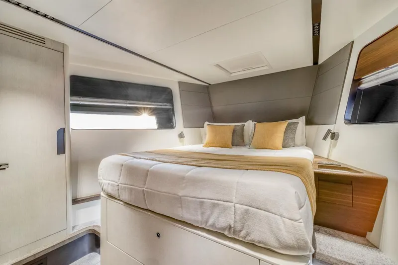 As 5 Yacht Photos Pics Luxurious bedroom interior of 2025 Astondoa AS 5 yacht with modern design and elegant furnishings.